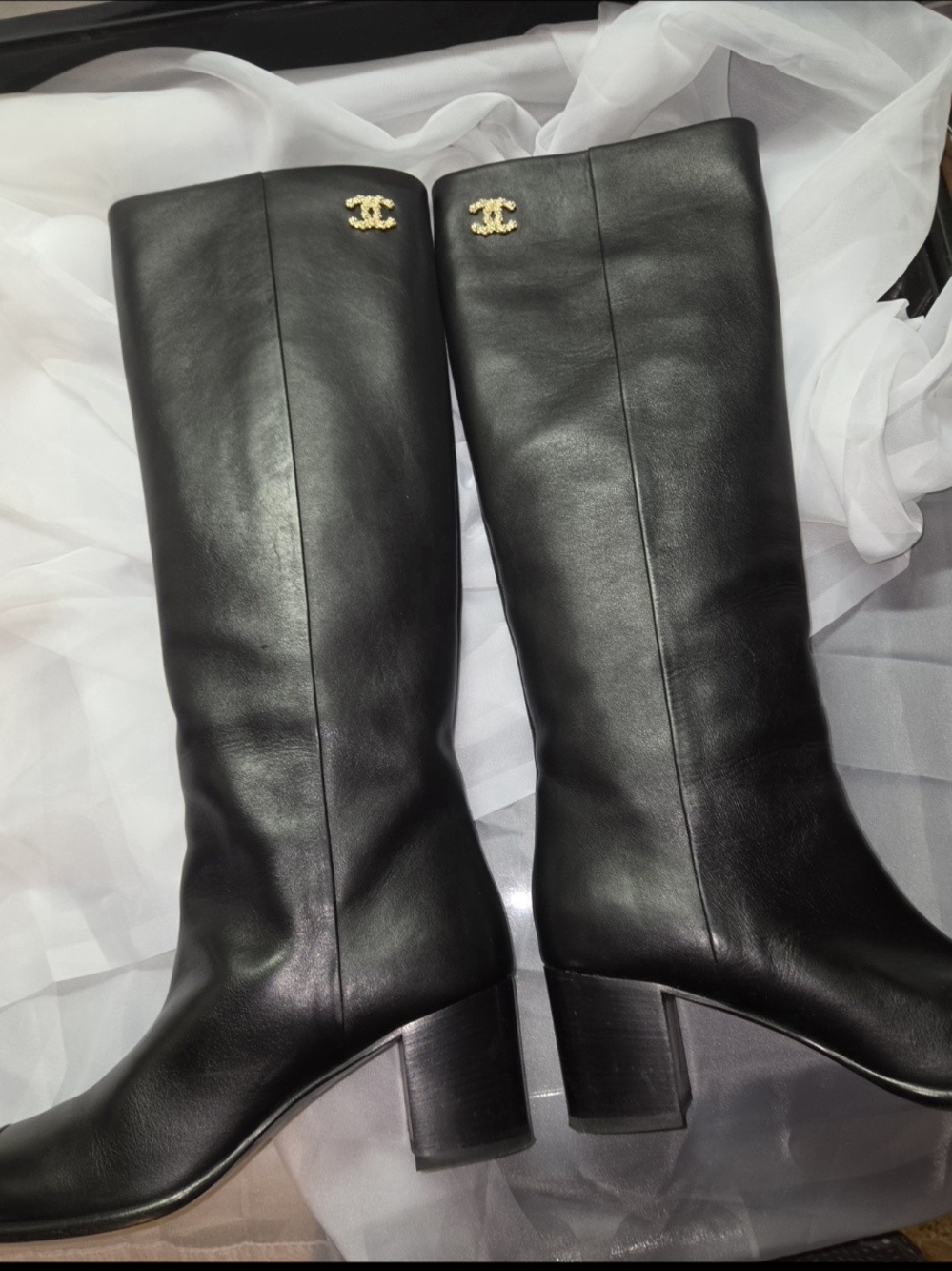 CHANEL Black Leather Knee-High Boots with Gold CC Emblem